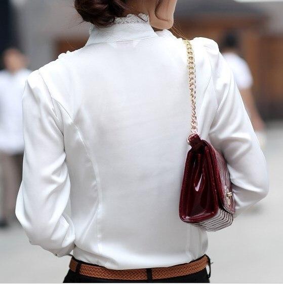 Julie - Élégante blouse blanche à col volanté et manches longues pour un look chic
